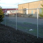 327-commercial chain link w/barbed wire