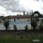 302-COM-ornamental iron pool enclosure, Riverview Place Apts.