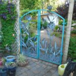 custom iron gate blue with flowers